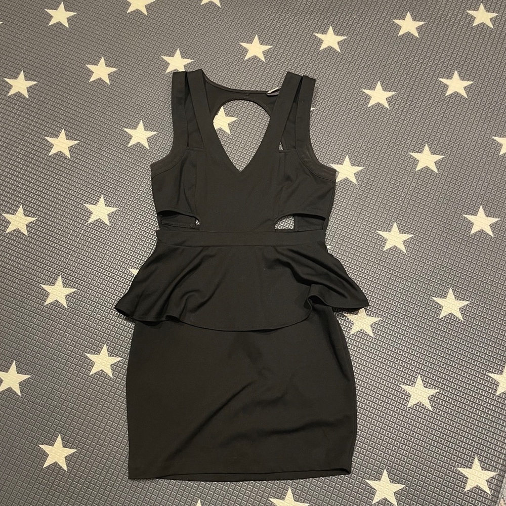 Black mini dress with cut outs and open back